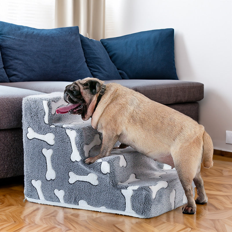 Bone-shaped pet stairs/ramp for dogs (placed beside sofa/bed) to protect joint safety, especially suitable for elderly dogs.